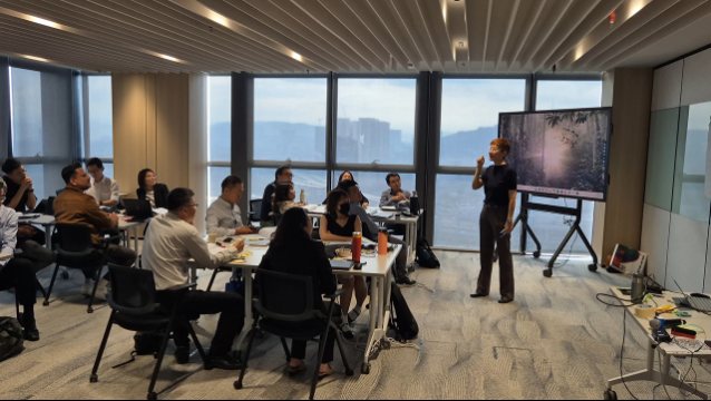 Joanne Kok presenting to a finance team
